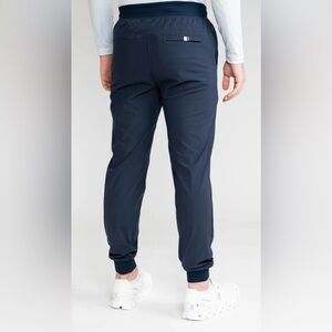 Navy blue performance joggers from Roback